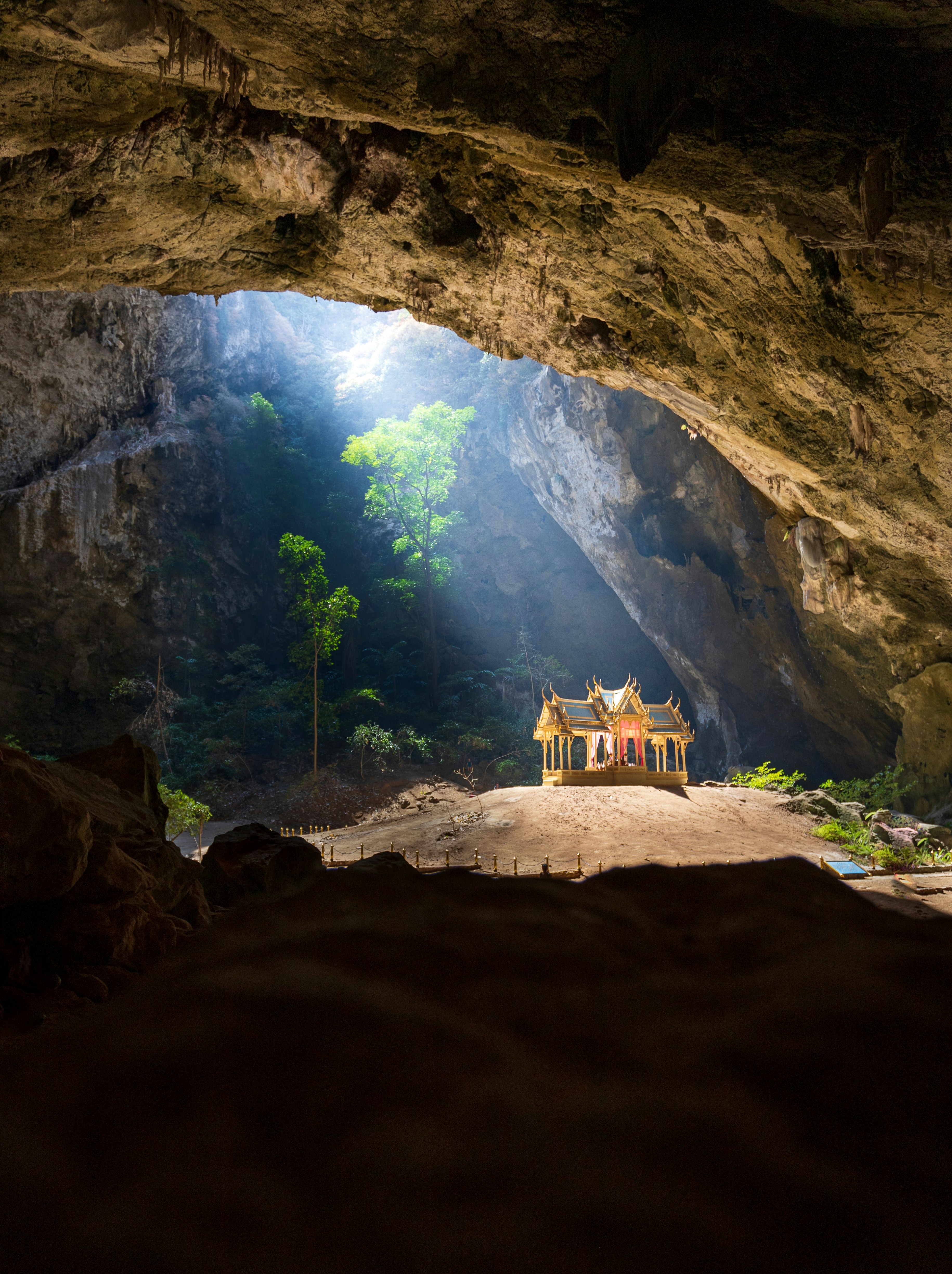 brown cave with blue and yellow lights